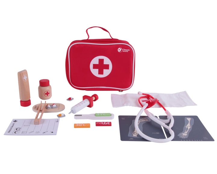 Red pretend play first aid kit with medical tools on a white background