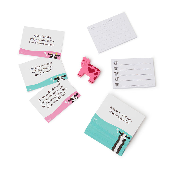 Set of humorous question cards with cartoon cow design on a white background