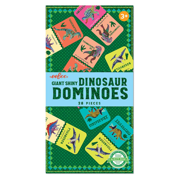 Packaging of dinosaur dominoes with colorful domino pieces on a green background